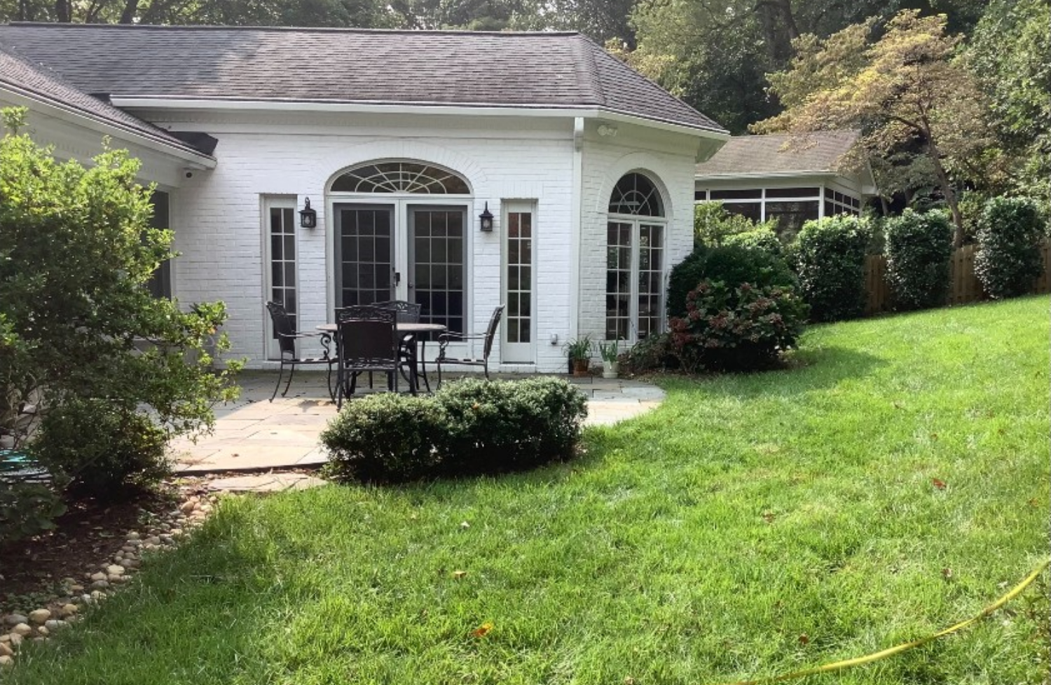 Before: Curved patio & retaining wall — Golden Master project