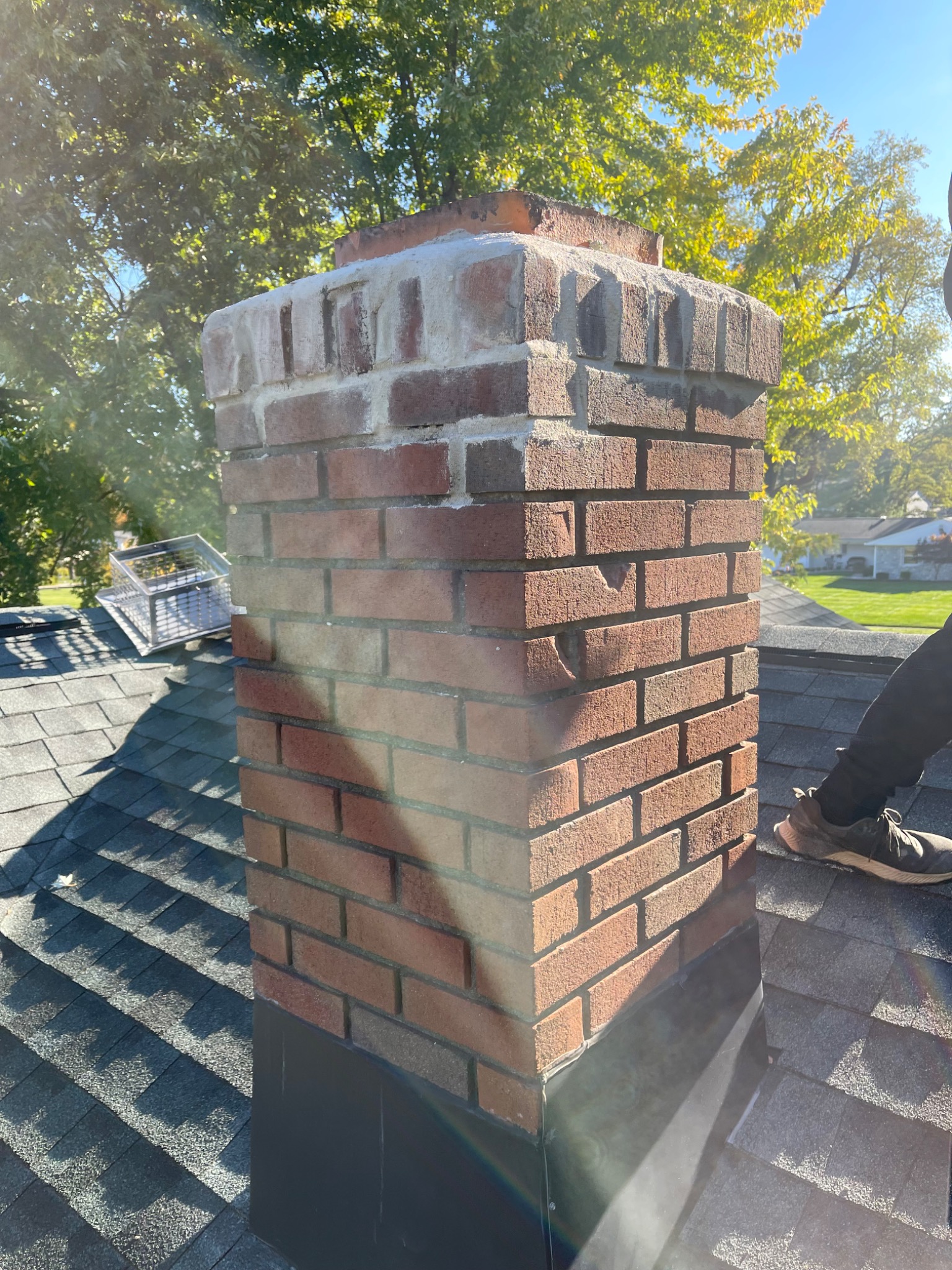 Close view of brickwork and repaired mortar joints on a chimney